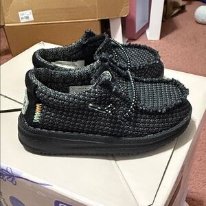Hey Dude Kids Black Woven Slip-On Sneakers with Subtle Multicolor Stitching
